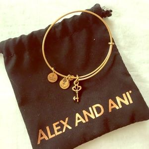 NOWT Alex and Ani gold key bracelet